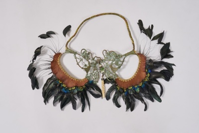 An Alex and Lee 'Peace and Love' copper, leather and feather necklace, 1970s