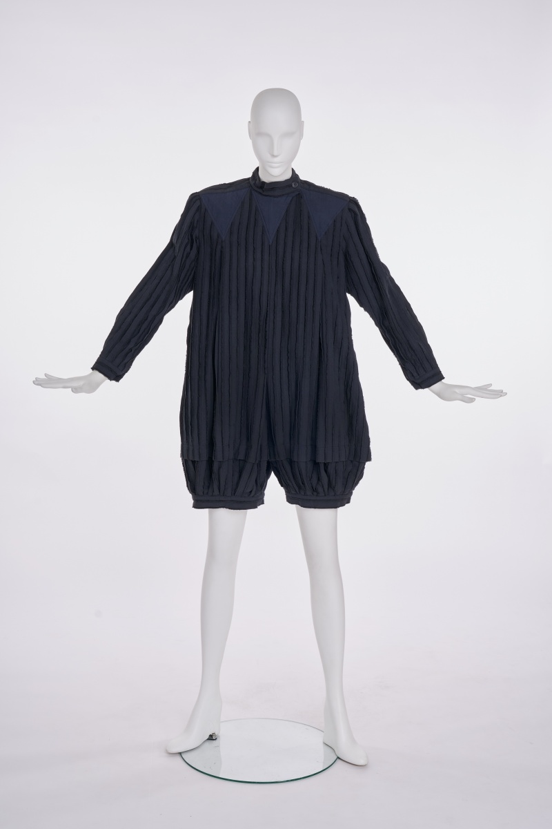 An Issey Miyake frayed black and navy cotton playsuit, Autumn-Winter 1981-82
