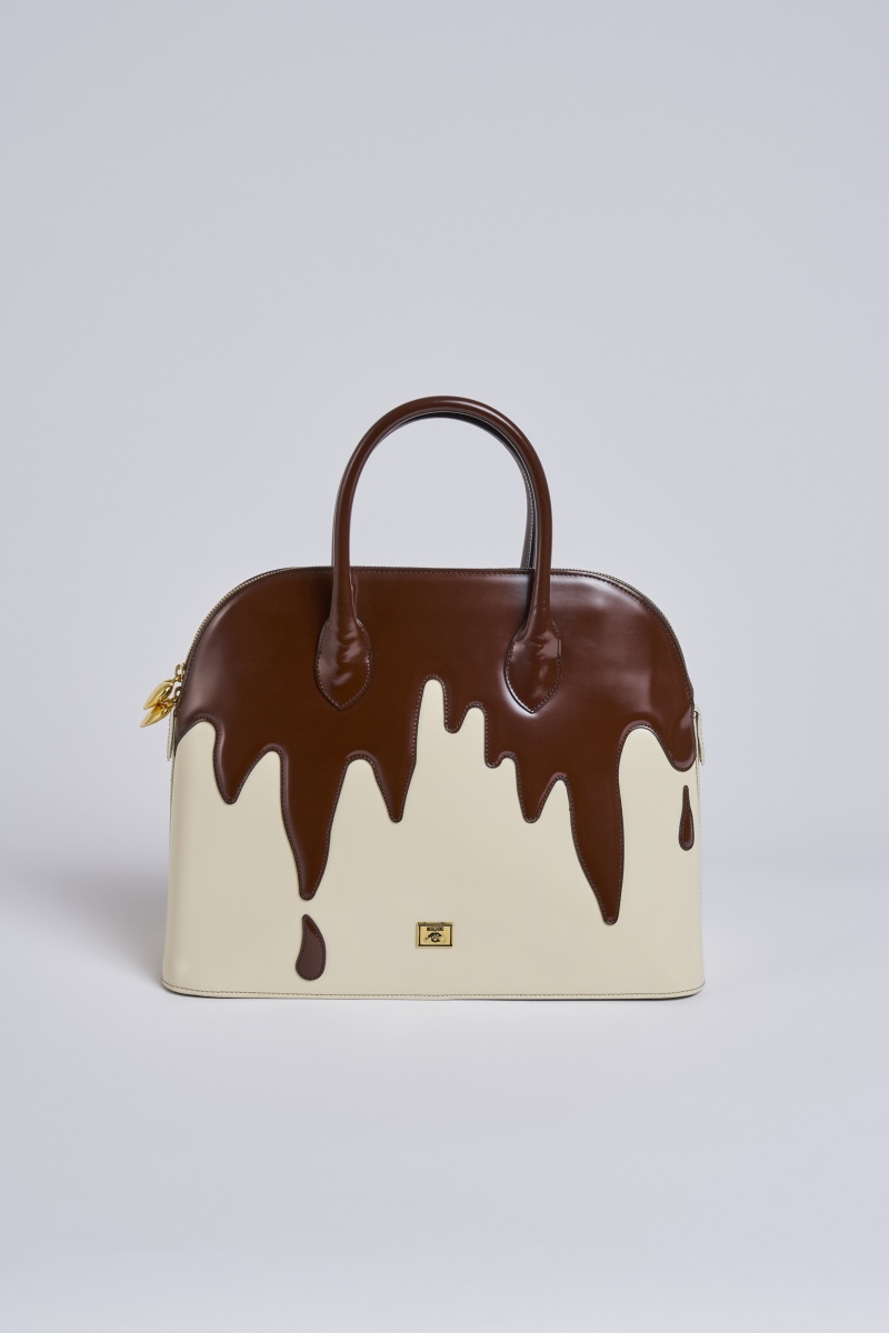 A Moschino 'Fudge the Fashionistas, Let Them Eat Cake' bag, circa 1996