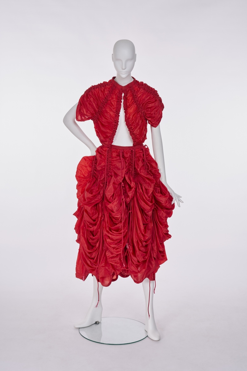 A Norma Kamali red nylon parachute ensemble, circa 1977