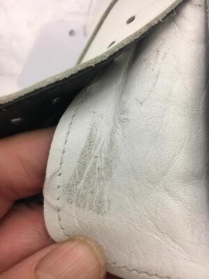 A pair of Comme des Gar&ccedil;ons men's white leather skull shoes, Spring-Summer 2011 - 9
