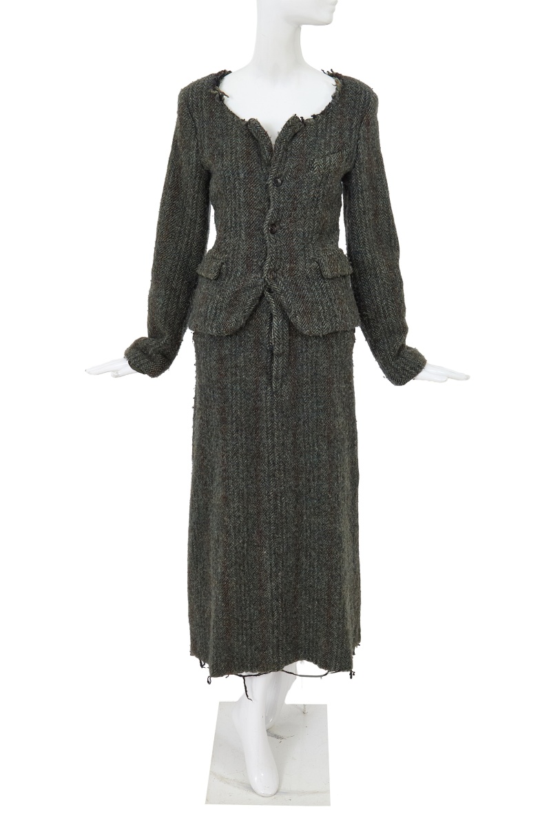 A Comme des Gar&ccedil;ons grey tweed suit, 'Metamorphosis' collection, Autumn-Winter 1994-95
