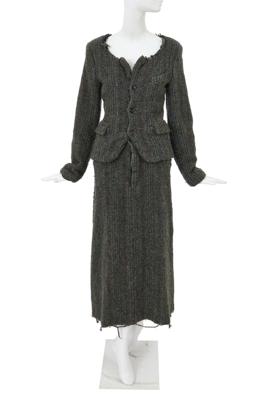 A Comme des Gar&ccedil;ons grey tweed suit, 'Metamorphosis' collection, Autumn-Winter 1994-95