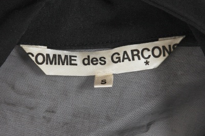 A Comme des Gar&ccedil;ons black wool and voile over-dress, 'Transcending Gender' collection, Spring-Summer 1995 - 8