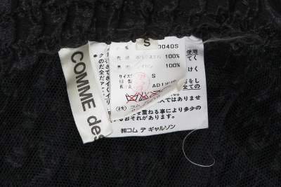 A Comme des Gar&ccedil;ons black polyester ensemble, 'Body Meets Dress - Dress Meets Body' collection, Spring-Summer 1997 - 9