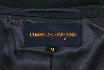 A Comme des Gar&ccedil;ons black gabardine suit, 'Hard and Forceful (Energy)' collection, Autumn-Winter 2000-01 - 11