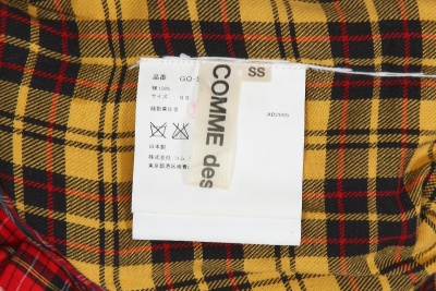 A Comme des Gar&ccedil;ons multi-tartan ensemble, 'Lost Empire' collection, Spring-Summer 2006 - 13
