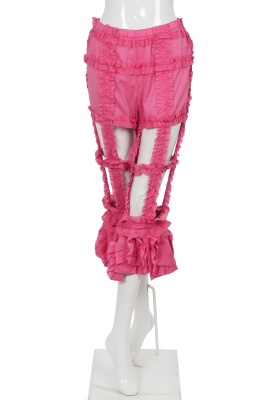 A Comme des Gar&ccedil;ons brown and pink ensemble, 'Cacophony' collection, Spring-Summer 2008 - 9