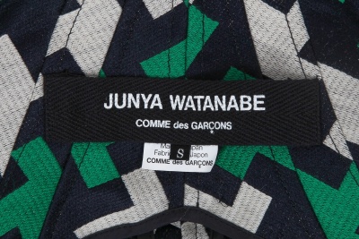 A Junya Watanabe/Comme des Gar&ccedil;ons green, white and black tailcoat, Spring-Summer 2006 - 9