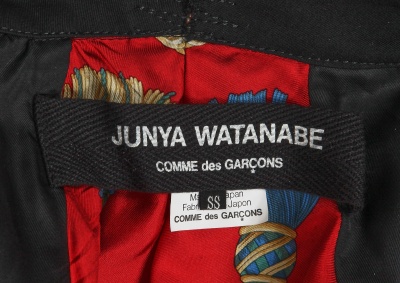 A Junya Watanabe/Comme des Gar&ccedil;ons black wool tailcoat, Spring-Summer 2006 - 11