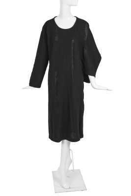 An important Comme des Gar&ccedil;ons distressed black wool dress, probably 'Holes' collection, Autumn-Winter 1982-83 - 2