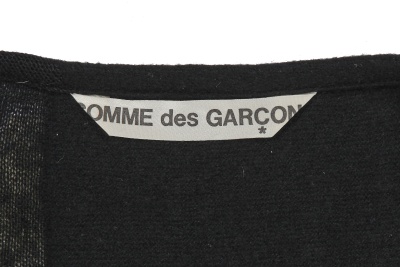 An important Comme des Gar&ccedil;ons distressed black wool dress, probably 'Holes' collection, Autumn-Winter 1982-83 - 9