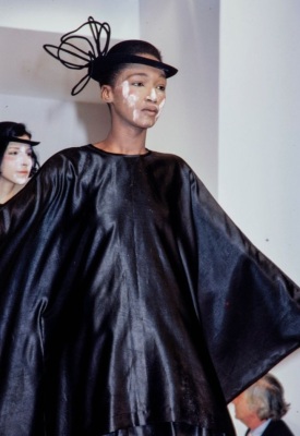 A Comme des Gar&ccedil;ons dark blue satin ensemble, 'Holes' collection, Autumn-Winter 1982-83 - 2