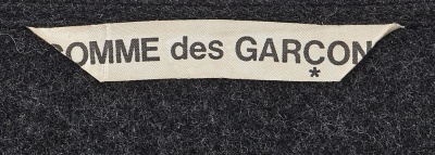 A rare and important Comme des Gar&ccedil;ons grey wool dress, 'Gloves, Skirts, Quilted Big Coats' collection, Autumn-Winter 1983-84 - 8