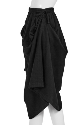 A Comme des Gar&ccedil;ons black wool ensemble, 'Gloves, Skirts, Quilted Big Coats' collection, Autumn-Winter 1983-84 s)' collection, Autumn-Winter 1984-85 - 6