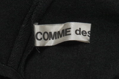A Comme des Gar&ccedil;ons black wool ensemble, 'Gloves, Skirts, Quilted Big Coats' collection, Autumn-Winter 1983-84 s)' collection, Autumn-Winter 1984-85 - 8