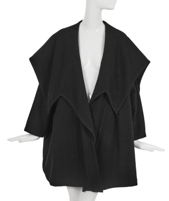 A Comme des Gar&ccedil;ons black wool coat, probably 'Gloves, Skirts, Quilted Big Coats' collection, Autumn-Winter 1983-84