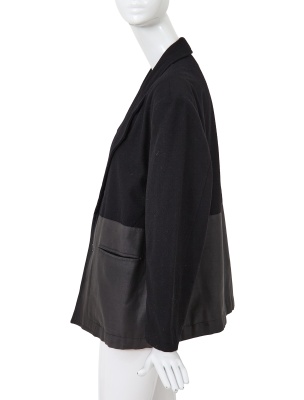 A Comme des Gar&ccedil;ons black wool and cotton blazer, probably 'Twist, Silk + Jersey, Knits (Patchworks)' collection, Autumn-Winter 1984-85 - 2